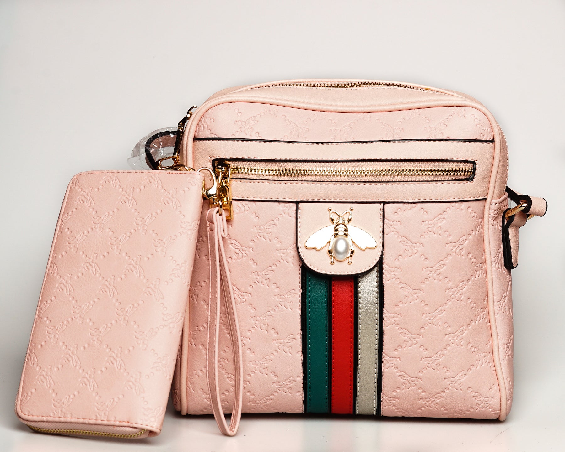 Gucci bag - A mini bag with pearl studs and metal bee detail. The striped  body is highlighted with blue enamel and red … | Gucci bee bag, Classic  gucci bag, Fashion